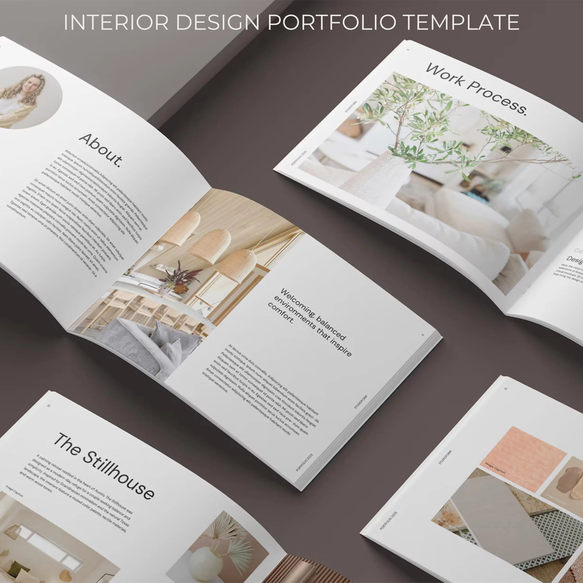 Open interior design portfolio with various pages on a brown background
