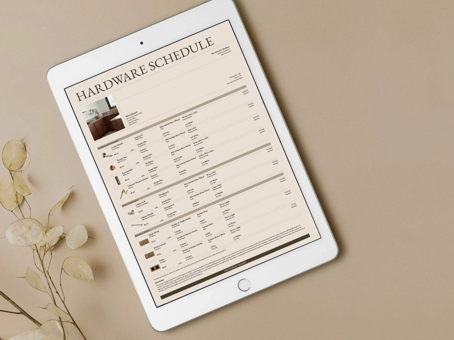 Tablet displaying a 'Hardware Schedule' on a beige background with dried flowers.