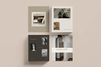 Four books with architectural and artistic images on a beige background