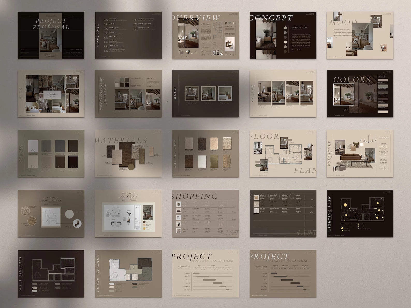 Collection of design project brochures displayed on a wall.